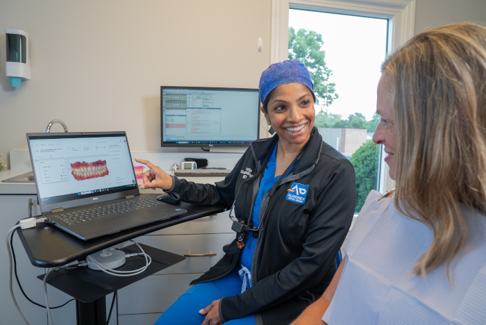 Dr. V with a patient at Almoney Dental Group in Dayton, OH
