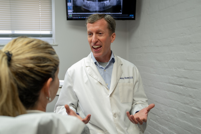 Dr. Brown with a patient at Almoney Dental Group in Dayton, OH